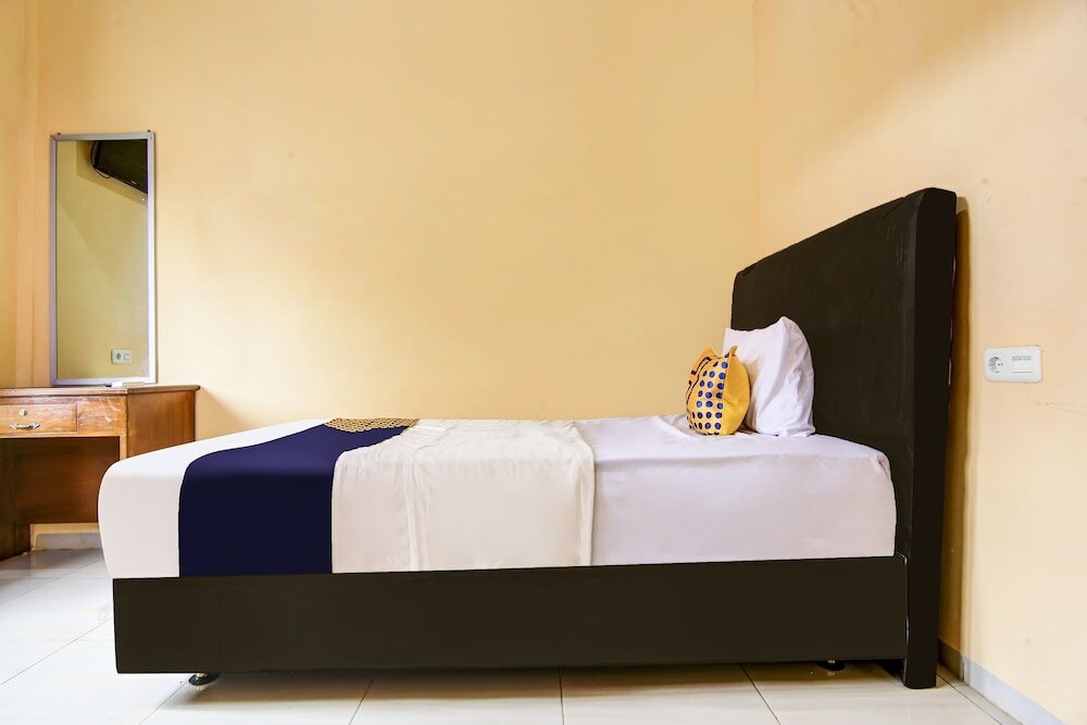 Фото Spot On 90433 Serasi Kost