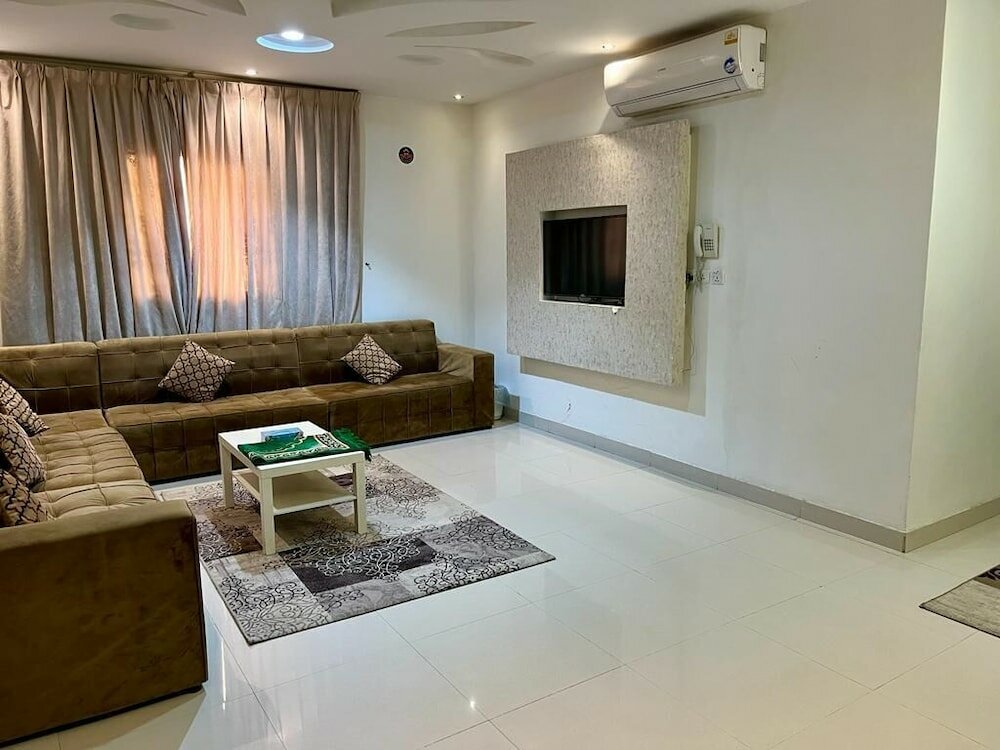 Фото Al-Aniqa Furnished Apartments