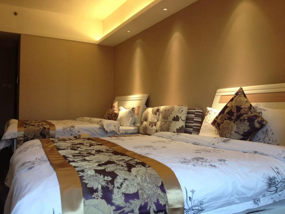 Фото Zixinju Aparthotel