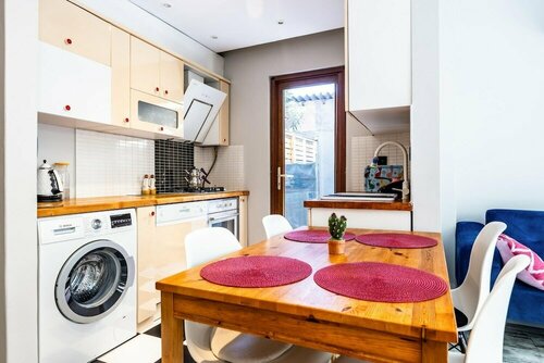Апартаменты Flat w Garden 10 min to Bull Statue in Kadikoy в Кадыкёй