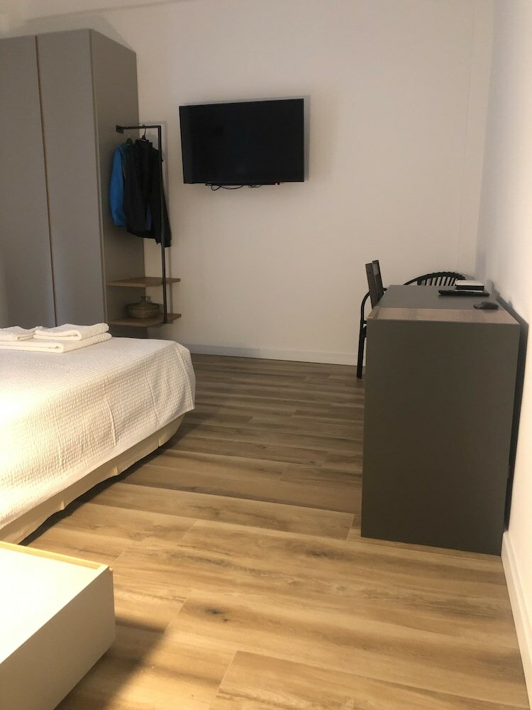 Фото A Due Passi Dalla Scalinata Rooms