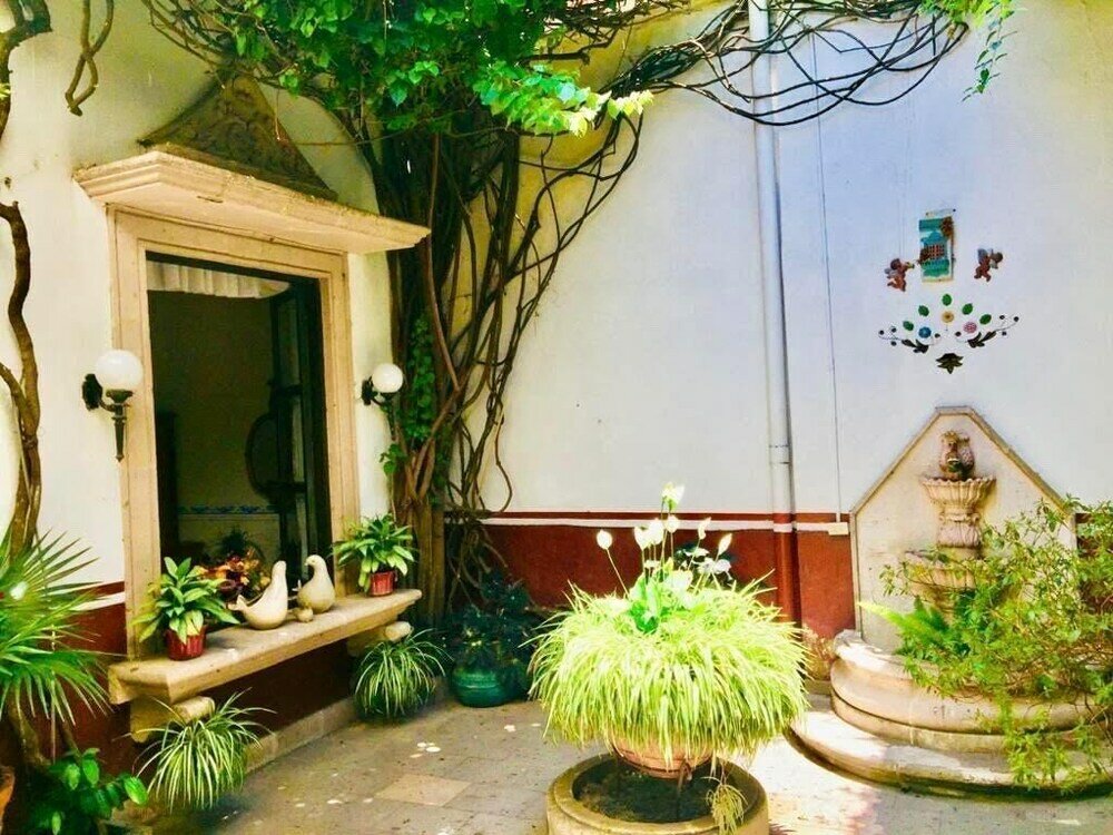 Фото Casa de la Dulce Reyna