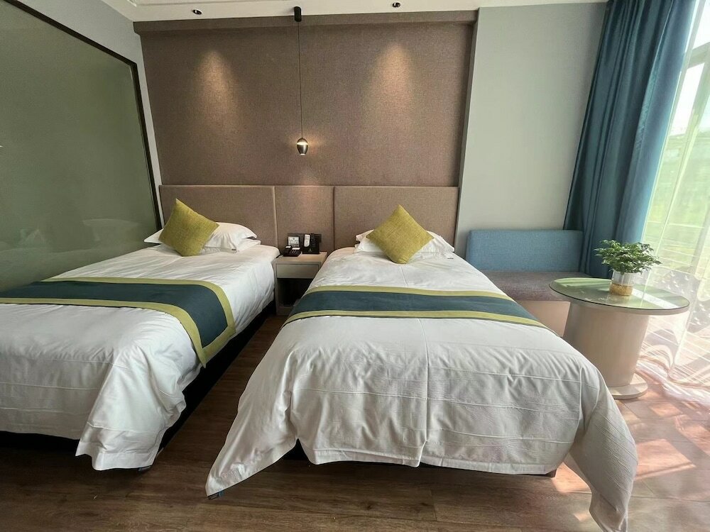 Фото Yiwu Manting City Hotel