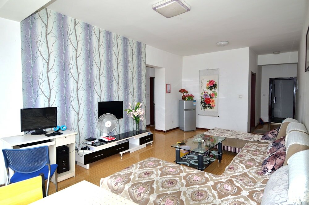 Фото Lanzhou Longshang Mingzhu Apartment Three-bedroom suite
