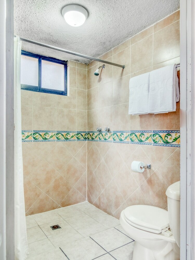 Фото Capital O Hotel La Siesta, Gómez Palacio