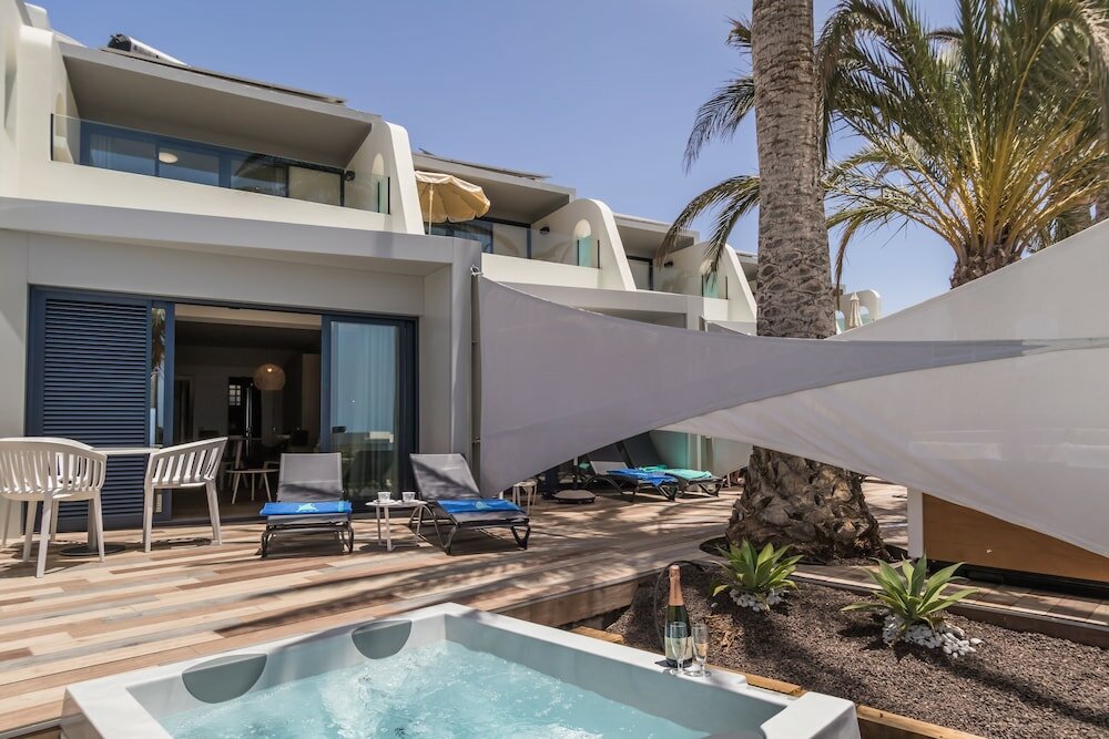 Фото Apartamentos Garden & Sea Boutique Lodging by Livvo