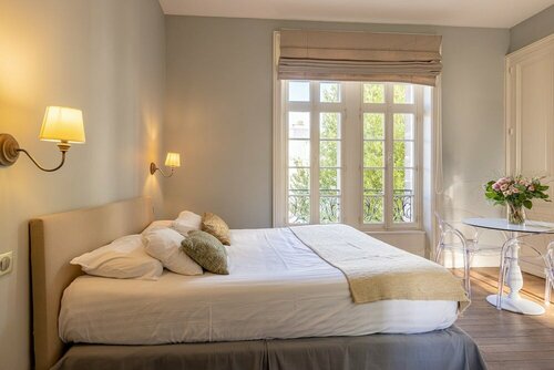 Апартаменты La Villa Beaupeyrat- Apparthôtels de charme dans bâtisse de caractère в Лиможе