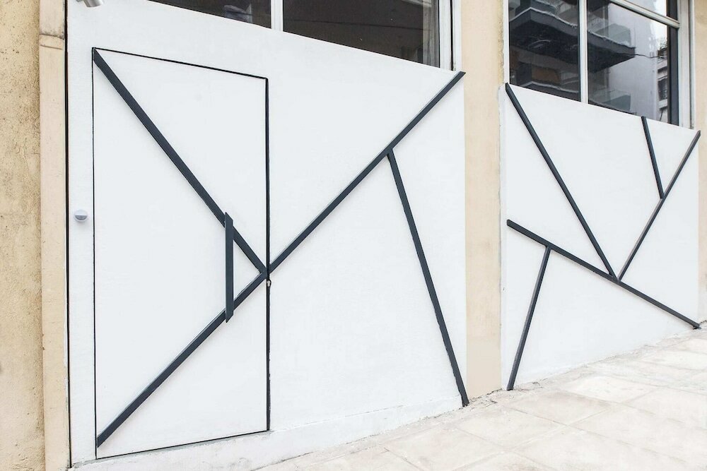 Фото Modern Industrial Apt In Neos Kosmos