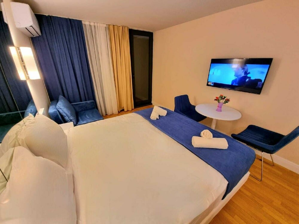 Фото Orbi Hotel Apartments