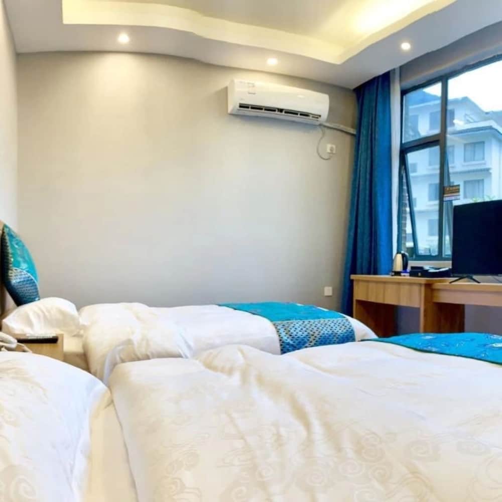 Фото Yangshuo Qingyunge Hotel