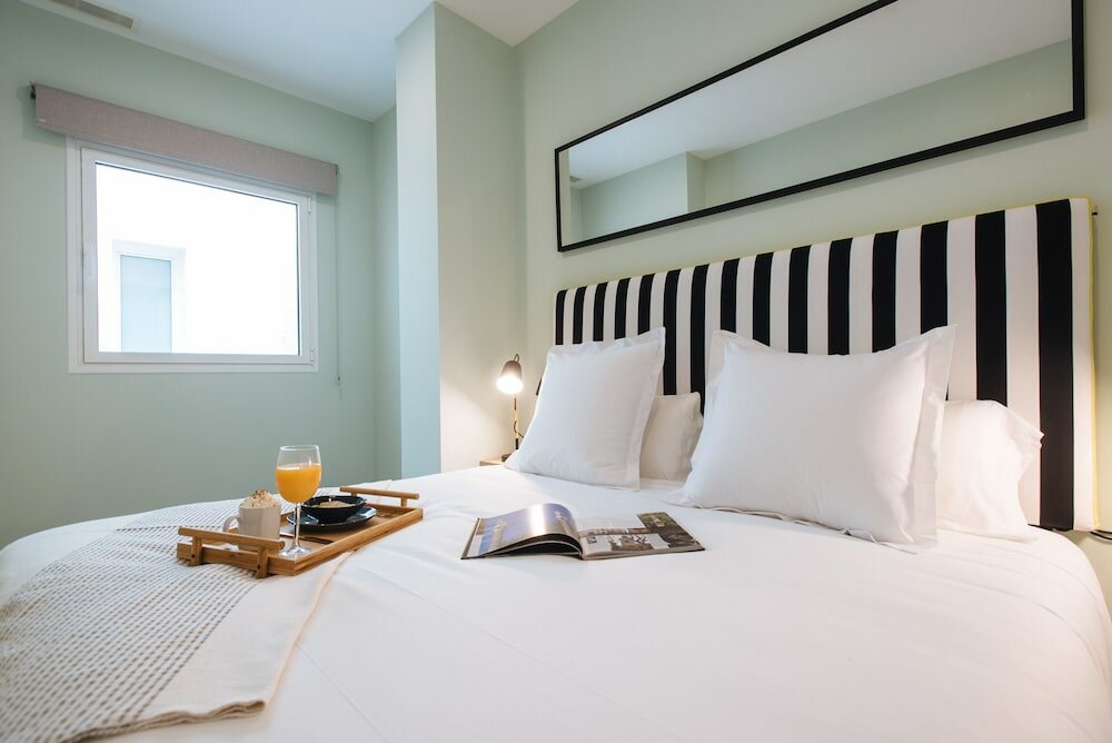 Фото Sercotel Sevilla Guadalquivir Suites