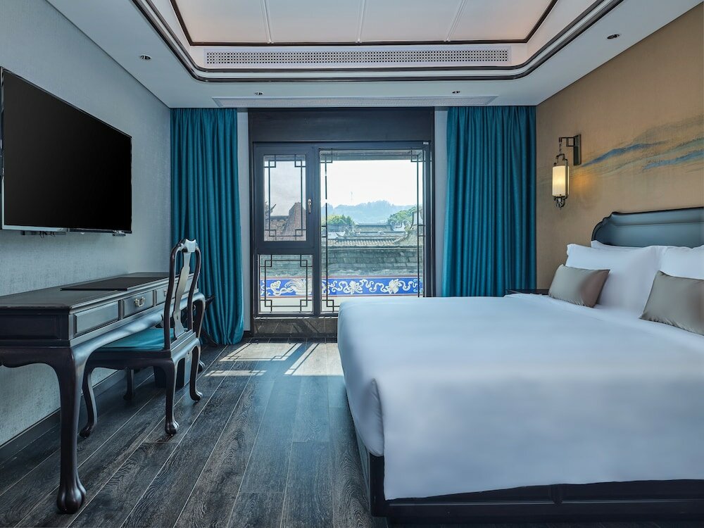 Фото San Po Hotel