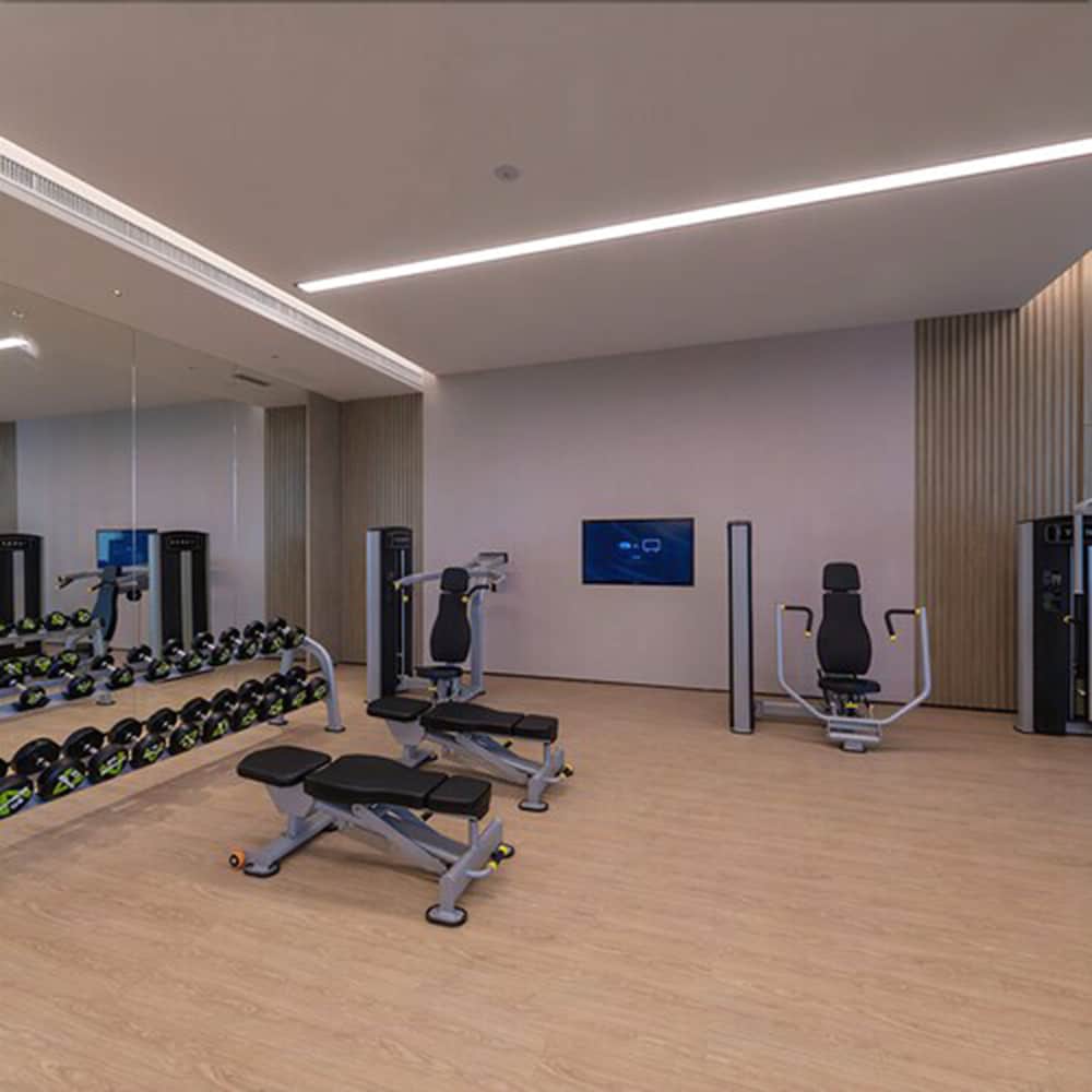 Фото New Century Hotel Zhenhai