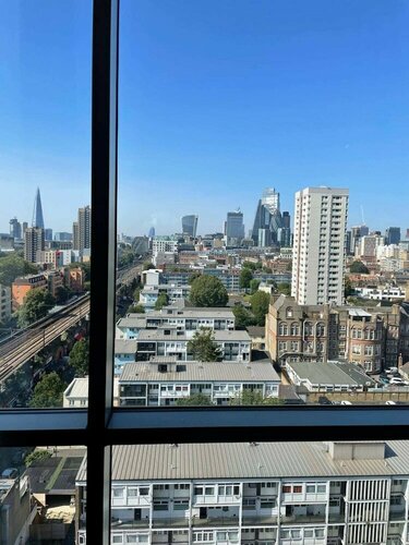 Апартаменты Sleek 2bd Flat W/views of The Shard - Shadwell! в Лондоне