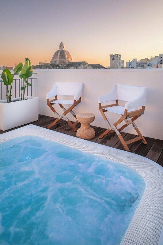 Гостиница WeLive Trapani luxury apartments & pool в Трапани