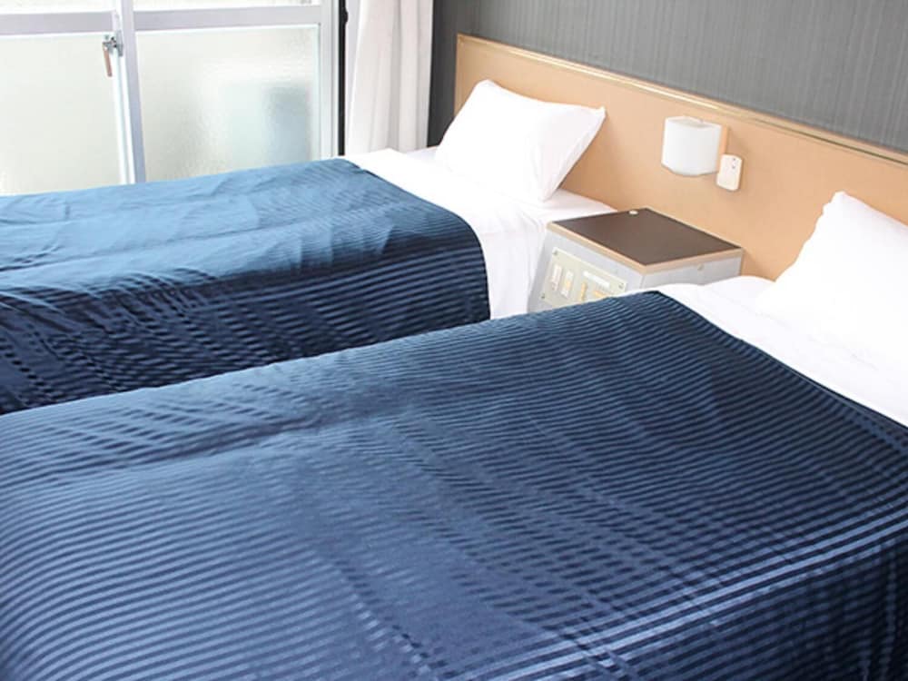 Фото Hotel Livemax Budget Namba