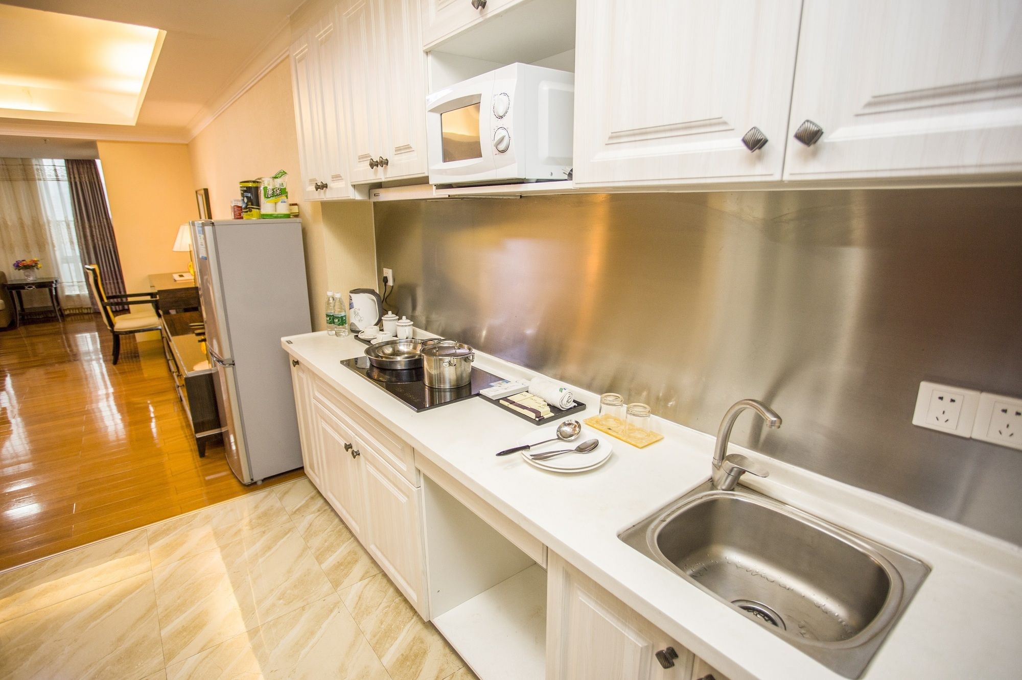 Фото Nomo Service Apartment The Legend