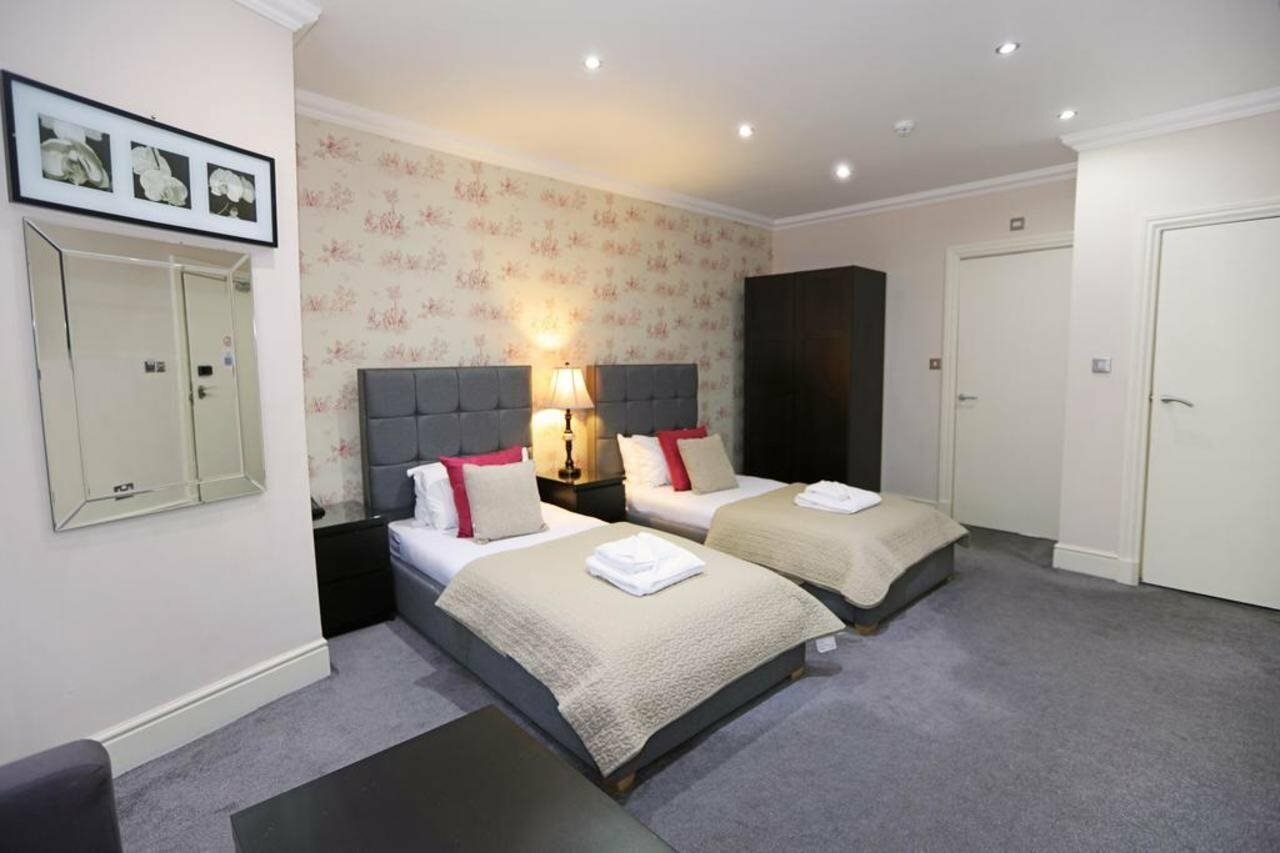 Фото Palmerston Suites