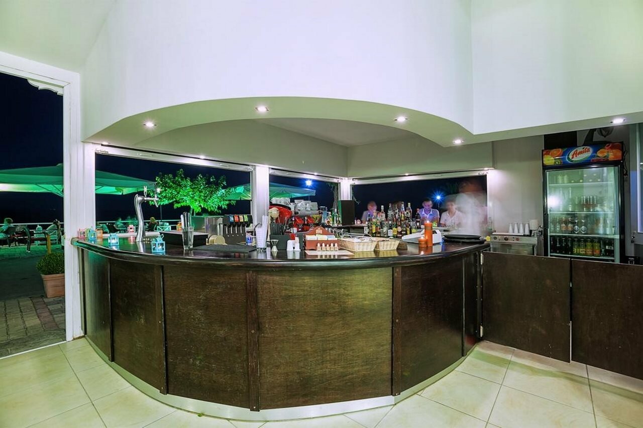 Фото Xenios Dolphin Beach Hotel