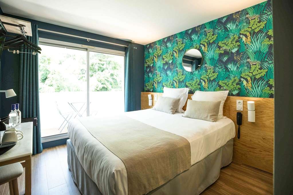 Фото T Boutique Hotel, an Ascend Hotel Collection Member