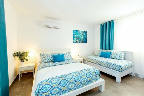 Гостиница Hotel Tropicana Suites Deluxe Beach Club & Pool
