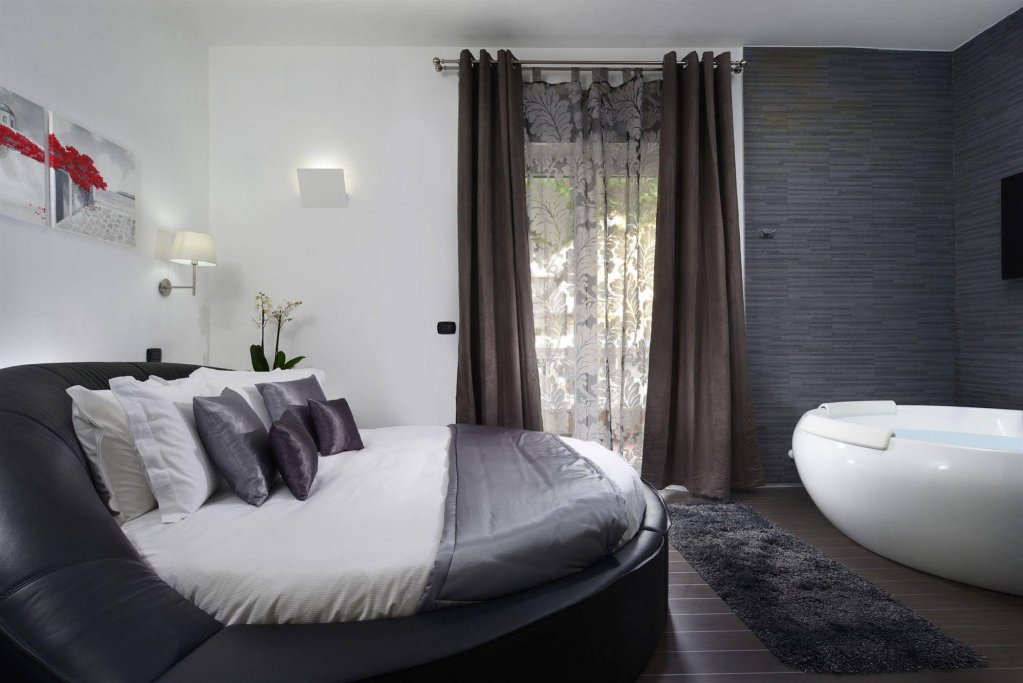 Фото Gregorio VII Luxury Suites