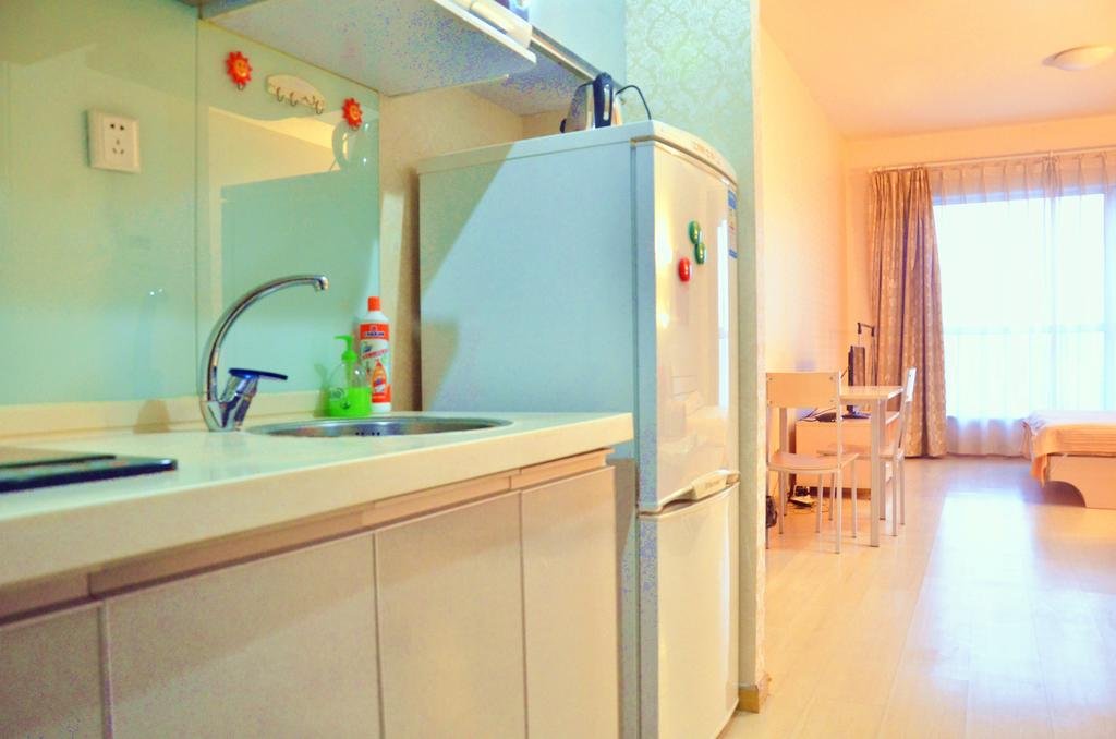 Фото China Sunshine Apartment Dacheng International