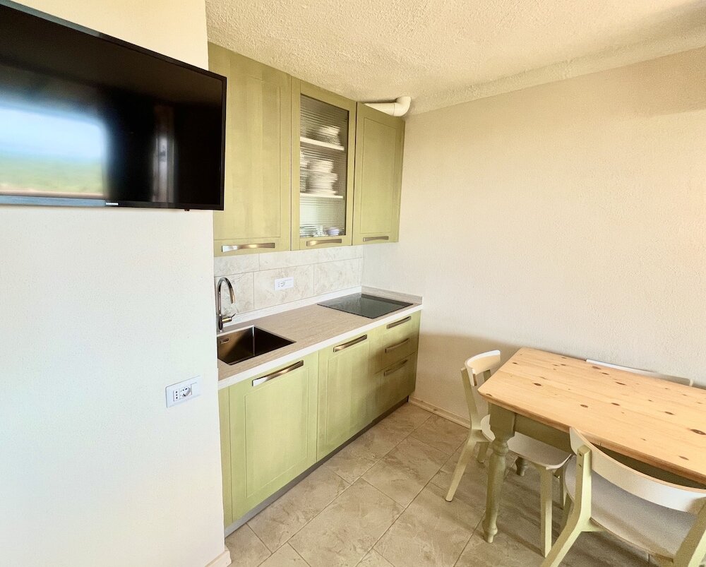 Фото Cugnana Verde Superiore con piscina