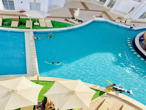 Гостиница Cozy Pool Level 1-bed Apartment в Хургаде