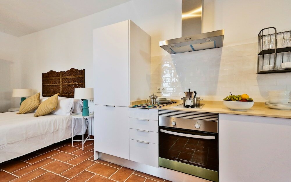 Фото Apartamentos Puerta Sevilla De Cordoba