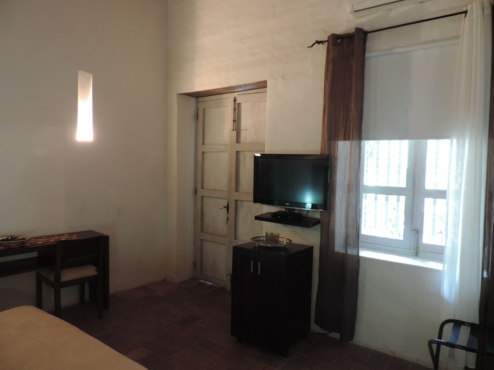 Фото Hotel El Candil de los Santos