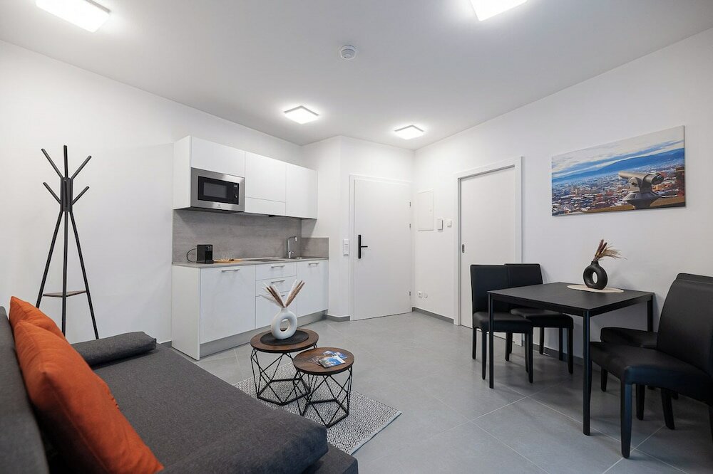 Фото Grazora Living Apartments