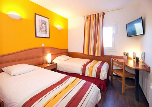Гостиница Hôtel Roi Soleil Mulhouse Sausheim в Тане-Гебвиллере