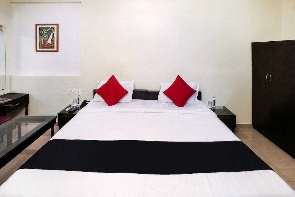 Фото Capital O 48482 Hotel Tribecca Inn