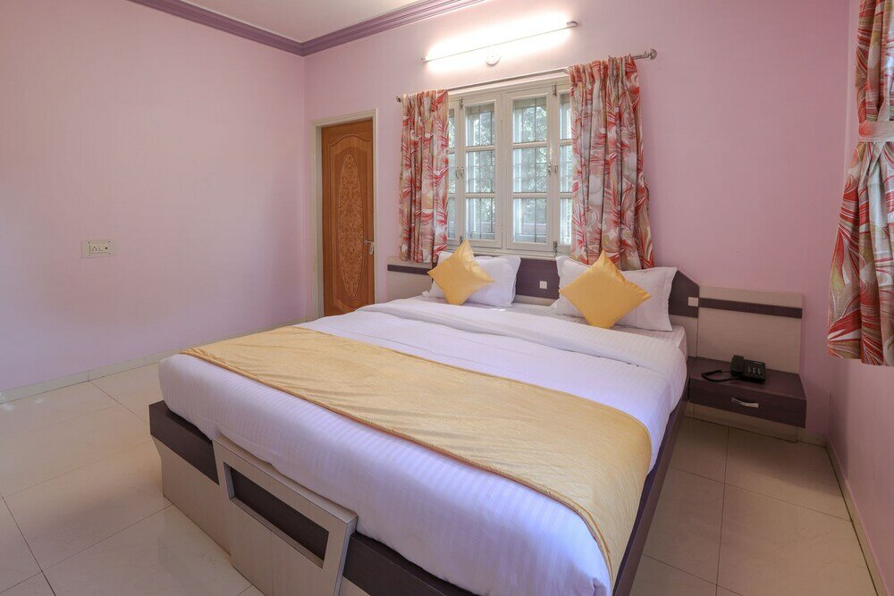 Фото Oyo 10031 Wind Chimes Boutique Guest House