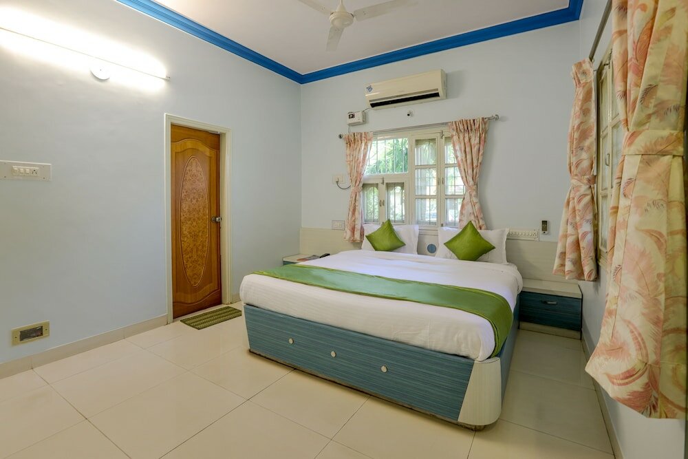 Фото Oyo 10031 Wind Chimes Boutique Guest House