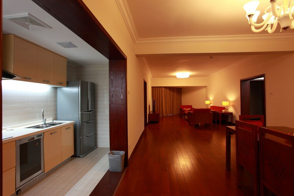 Фото Ming Wah Apartment Shenzhen