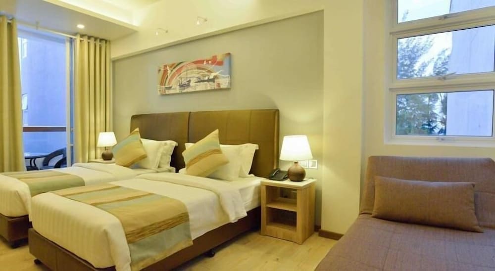 Фото Coconut Tree Hulhuvilla Beach