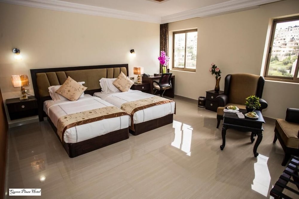 Фото Queen Plaza Hotel