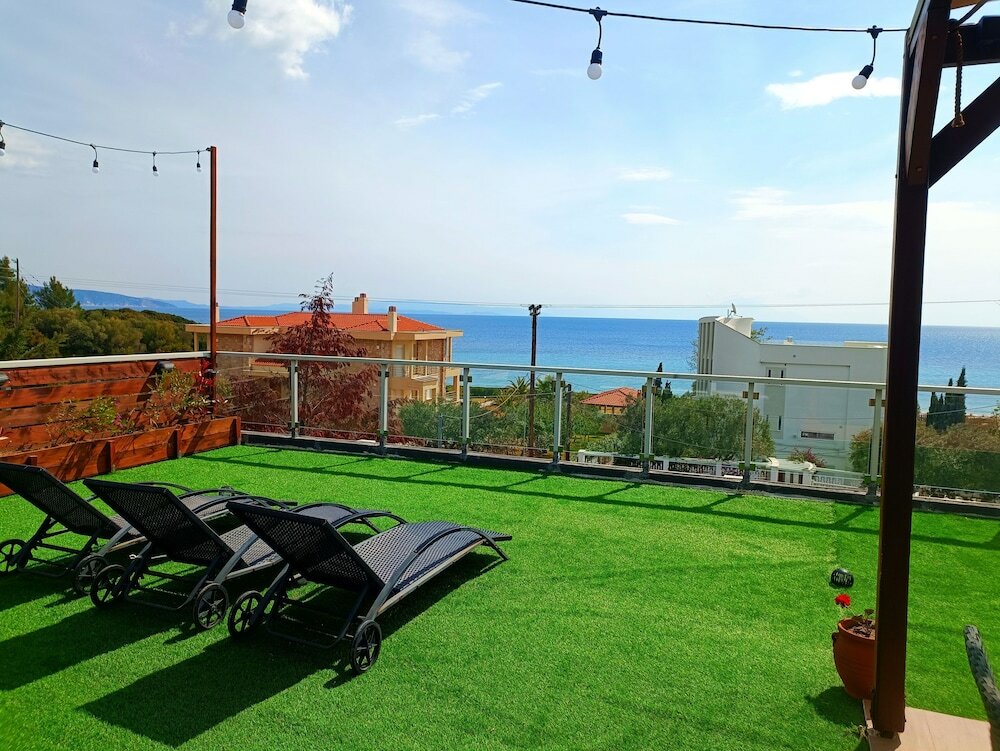 Фото Salonikiou Beach Deluxe Apartments