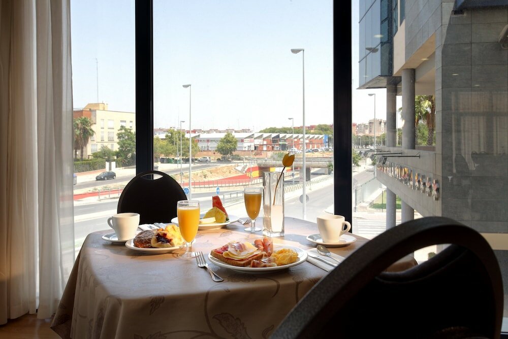 Фото Exe Sevilla Palmera