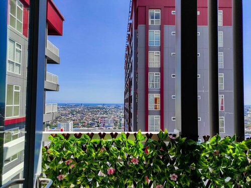 Гостиница Modern and Elegant 2br at Vida View Apartment by Travelio в Макасаре