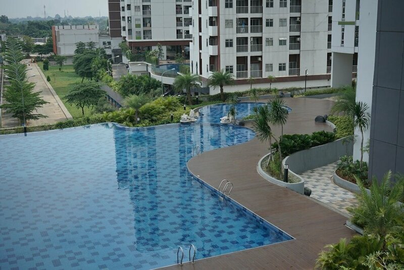 Гостиница Homey And Simply 2Br At Akasa Pure Living Bsd Apartment