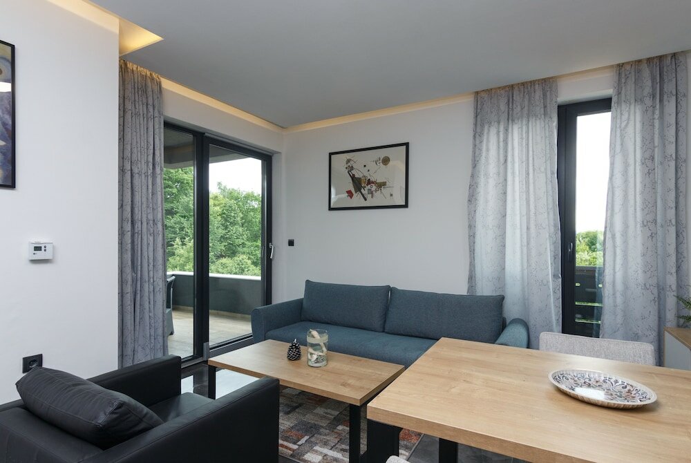 Фото Deluxe Feliciano Apartments