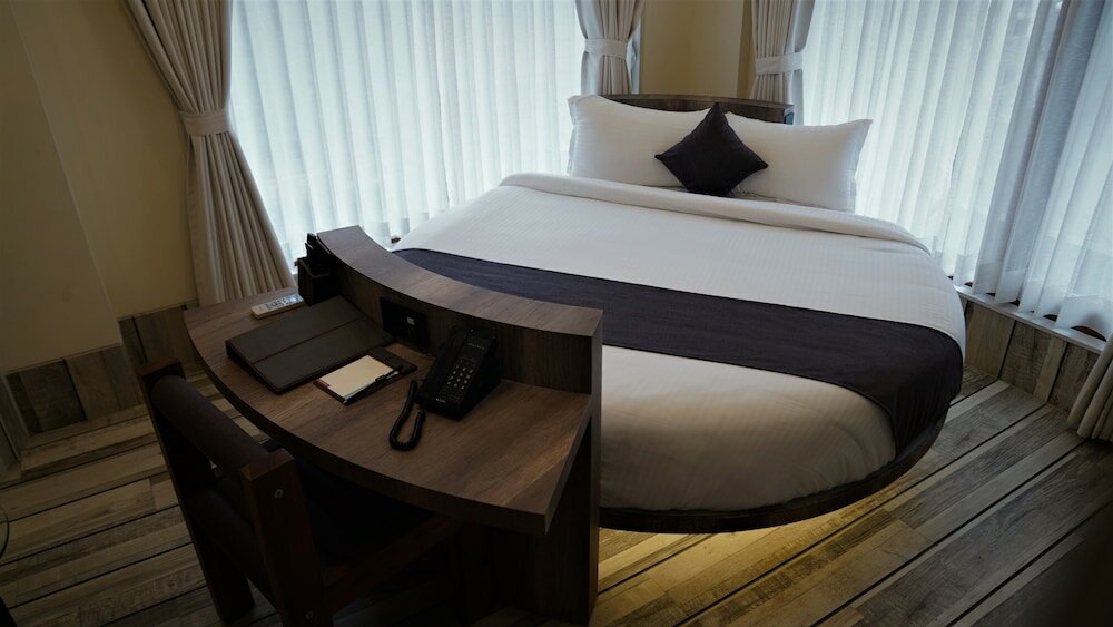 Фото De Glance Hotel