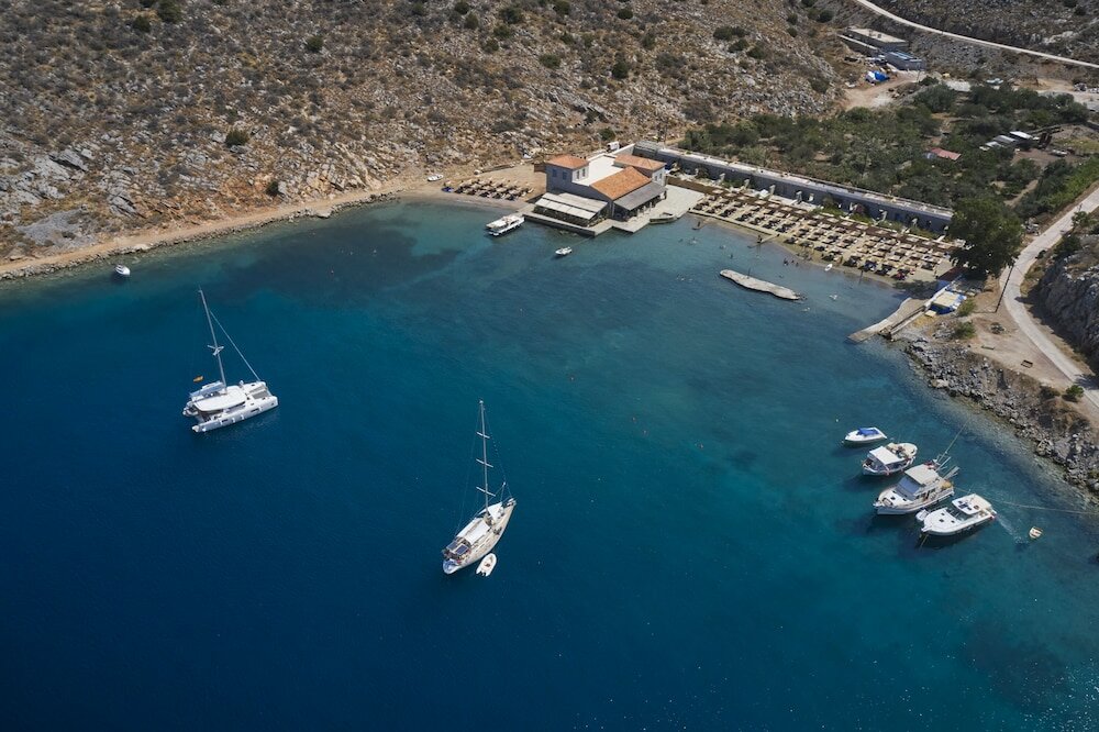 Фото Mandraki Beach Resort - Adults Only