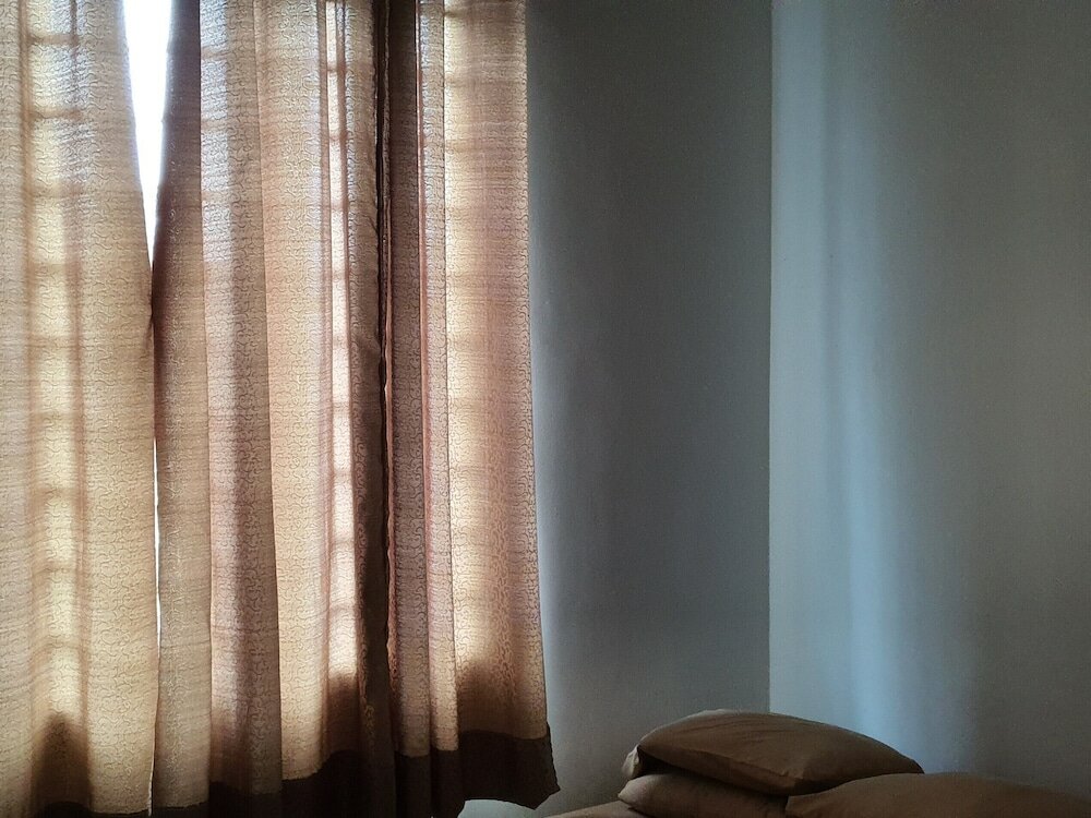 Фото Oyo Home 90496 Delima Homestay