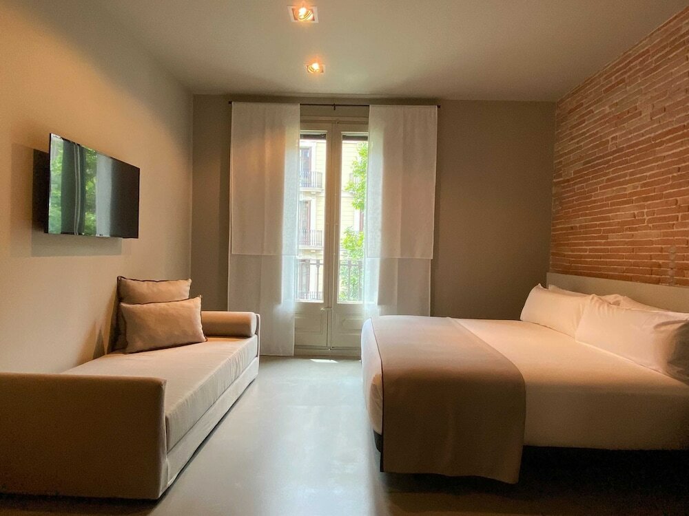 Фото Uma Suites Pau Claris