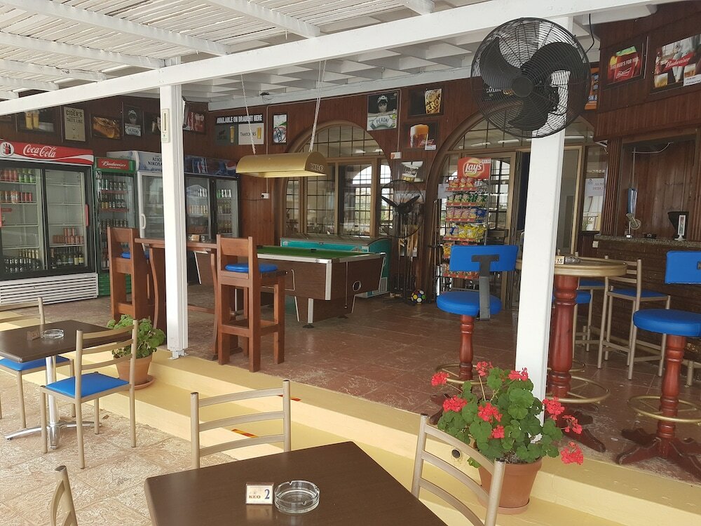 Фото Cosmelenia Hotel Apartments