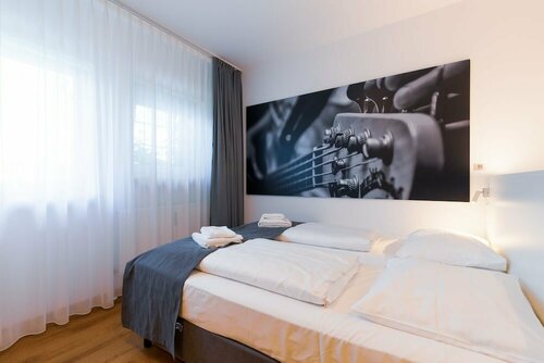 Гостиница Mk Hotel München Max Weber Platz в Мюнхене